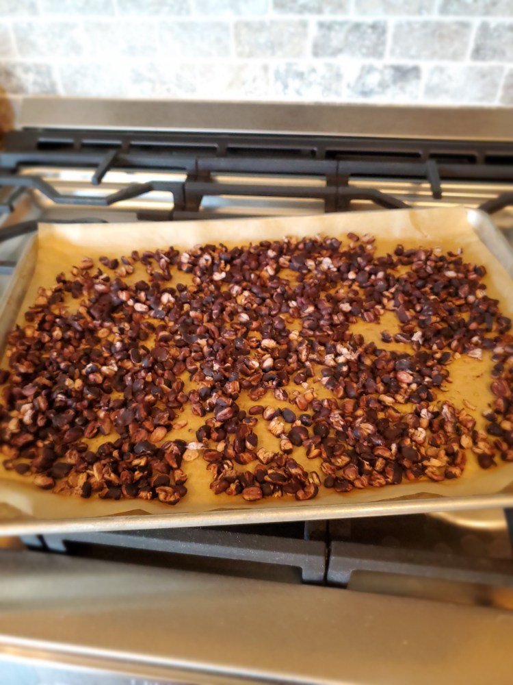 Baked blackbeans sitting on sheet