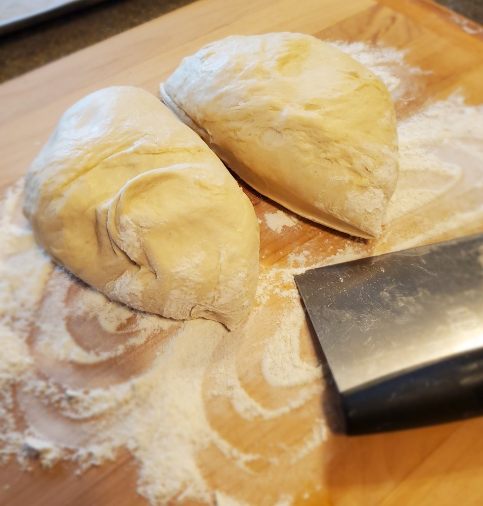 Bread dough cut in half