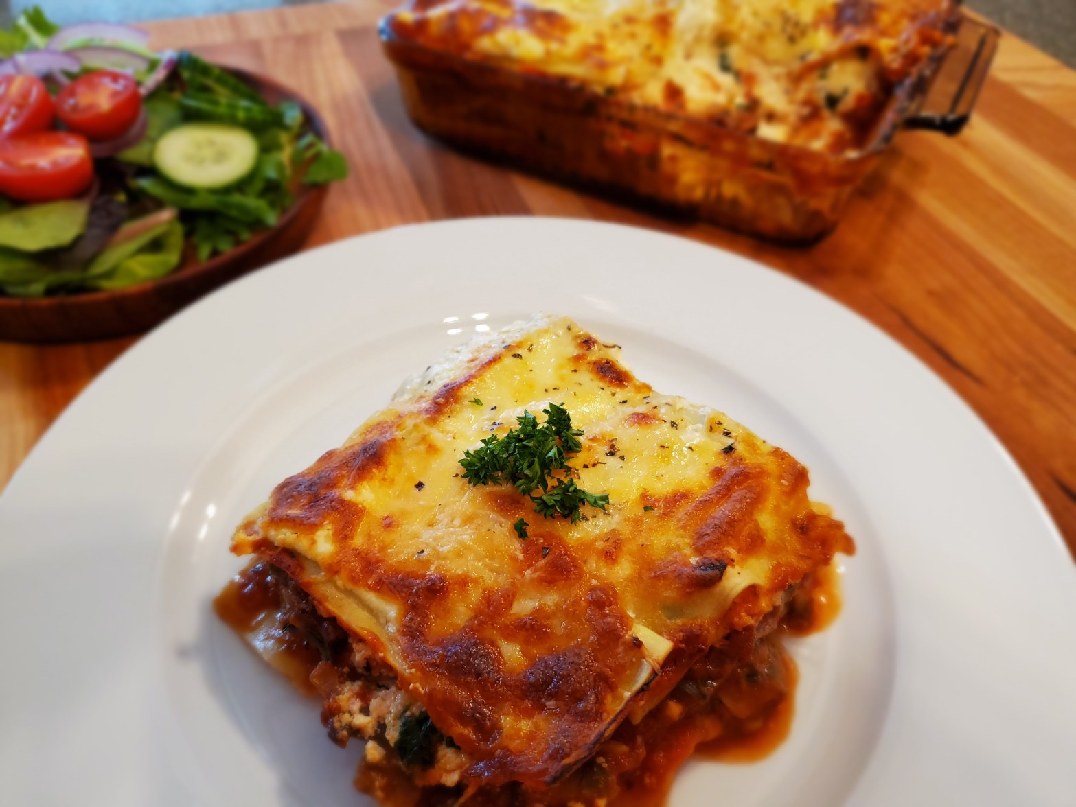 piece of mushroom spinach lasagna on plate