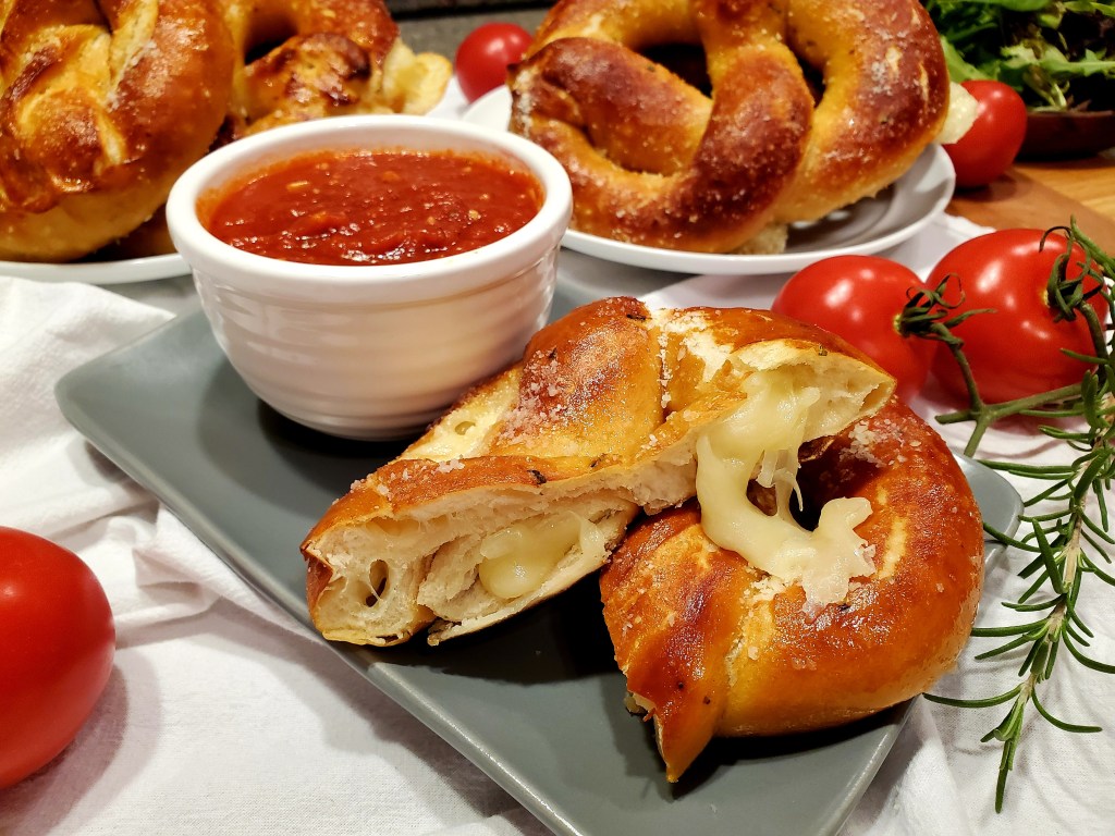 Cheese filled pretzel cut open