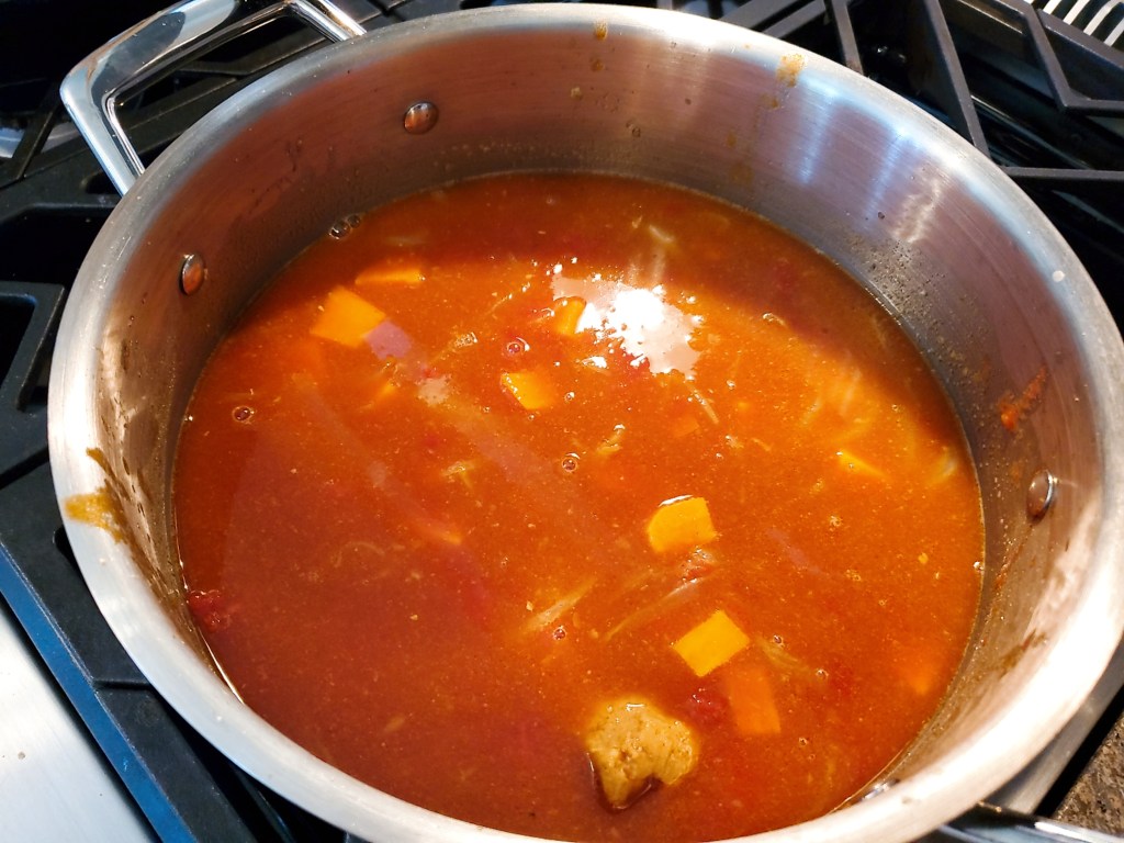 African stew after adding all ingredients.